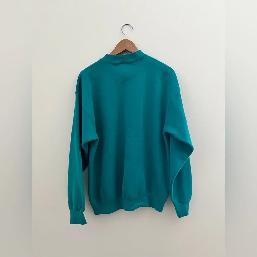 Vintage Tultex Disney Universal Studios Teal Crewneck Sweater